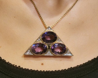 Rotatable statement pendant with diamonds and amethyst in 585 yellow gold and white gold