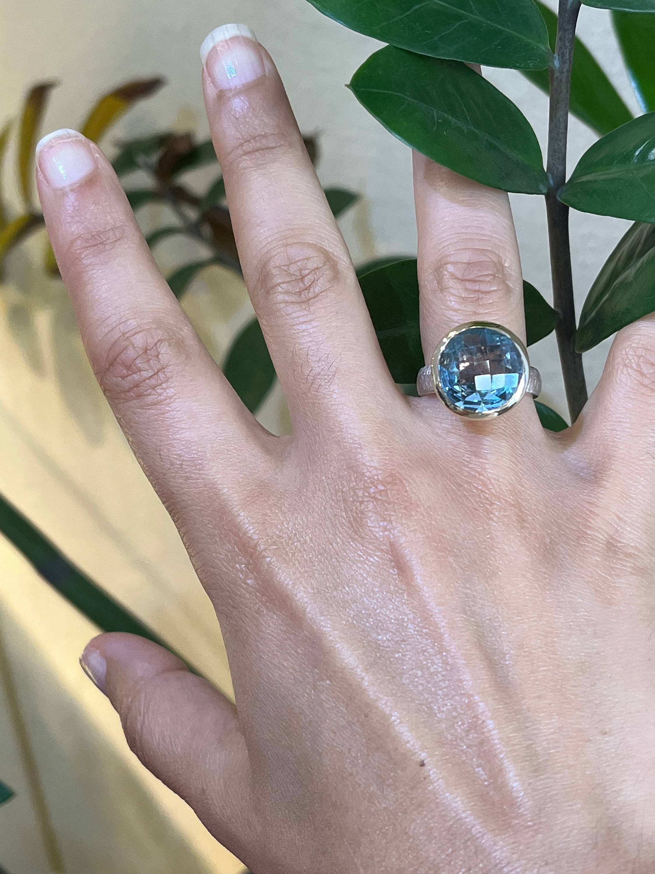 Sterling Silver Ring With Gold-plated Setting and Light Blue