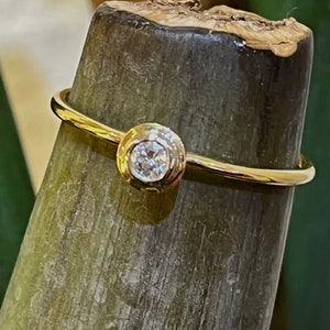 Yellow gold ring 750, with setting plate 960 with diamond 0.10 image 1