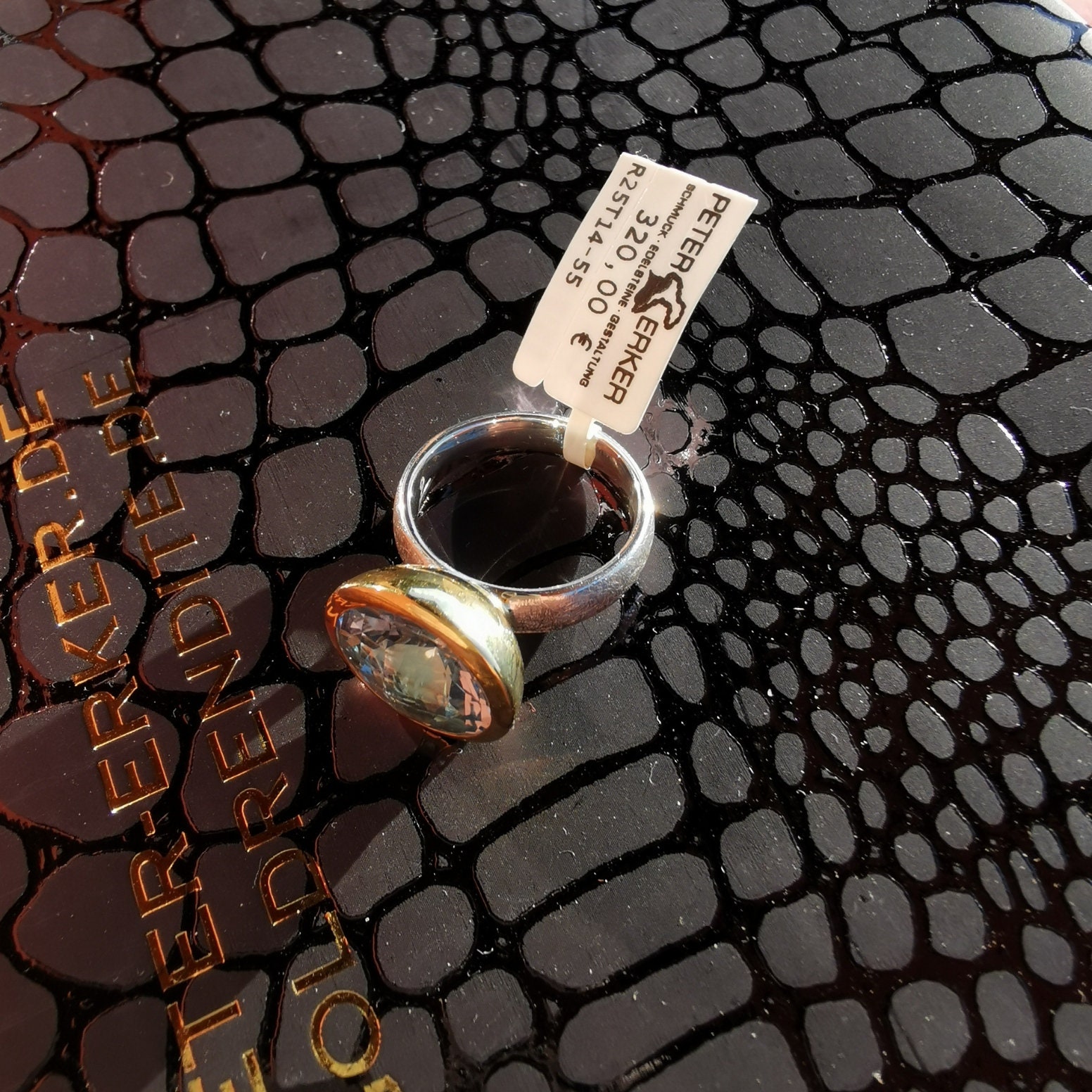 Sterling Silver Ring With Gold-plated Setting and Light Blue
