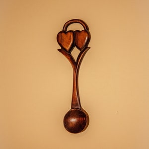 Welsh love spoon with two hearts entwined