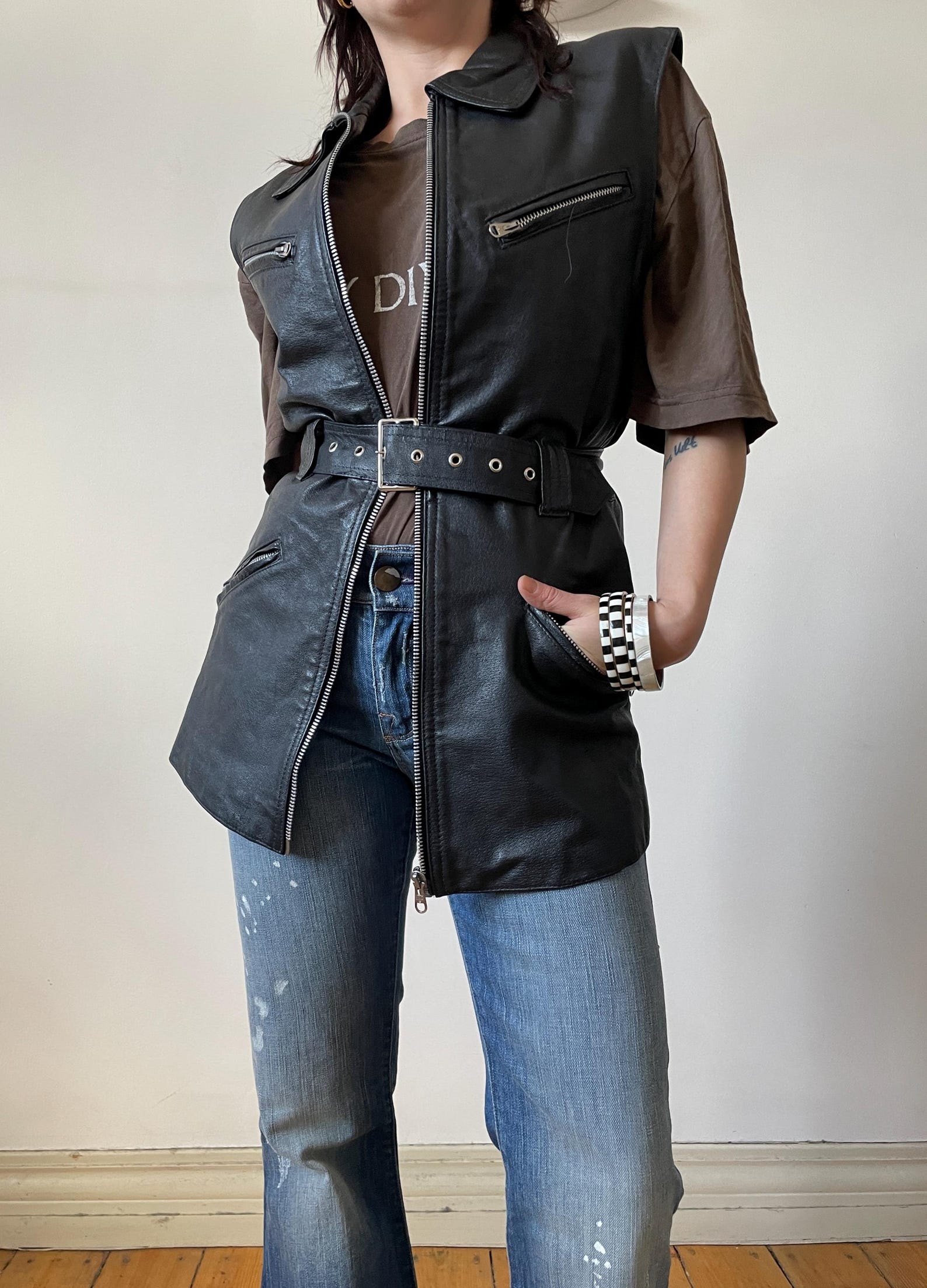 Black Leather Backless Vest With Rv Stamped Buttons