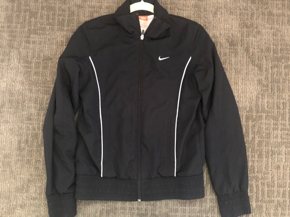 black nike jacket with white zipper