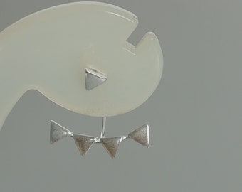 May include: Silver triangle earrings with a single triangle at the top and four triangles hanging down in a row.