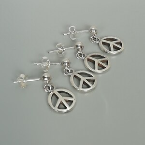 TBC Signature Peace Danglers main image 0