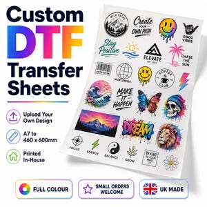 May include: A white sheet of custom DTF transfer designs featuring various colourful graphics including a melting smiley face, a butterfly, a lion, mountains, and text such as Create Your Own Path, Make It Happen, and Dream, with sizes from A7 to 460 x 600mm.