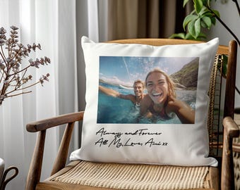 May include: A square white scatter cushion featuring a rectangular colour photograph of two people swimming in the ocean. Below the image, the black cursive text reads: Always and Forever, All My Love, Ami xx. The cushion has a smooth, solid white fabric finish.
