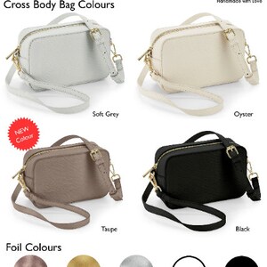 May include: Five different colors of small crossbody bags with gold zippers and hardware. The colors are soft grey, oyster, taupe, black, and a new color, which is a light brown. The image also shows five different foil colors: metallic rose gold, metallic gold, metallic silver, white, and black.