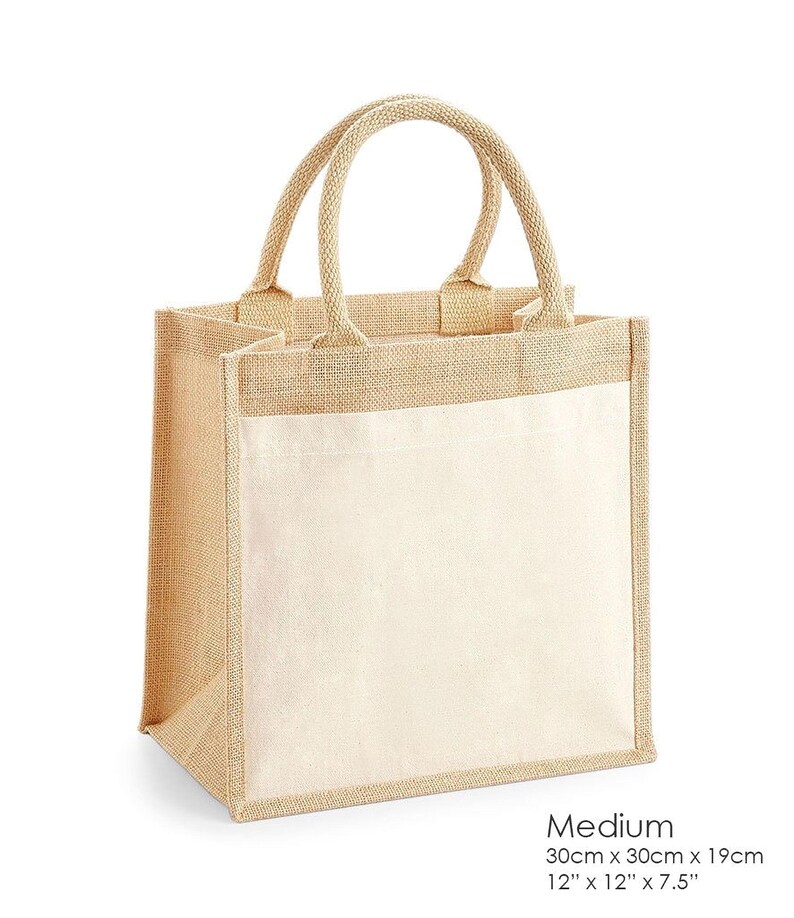 A medium-sized beige canvas tote bag with handles and a front pocket, measuring 30 cm x 30 cm x 19 cm.