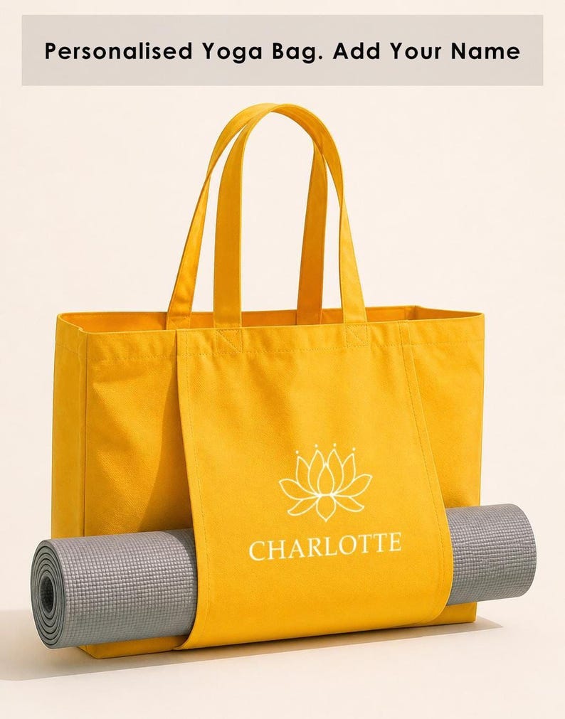A yellow tote bag with a yoga mat rolled up inside, displaying the brand name "CHARLOTTE" on the front.