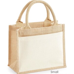 A small beige tote bag with handles and a flap closure.