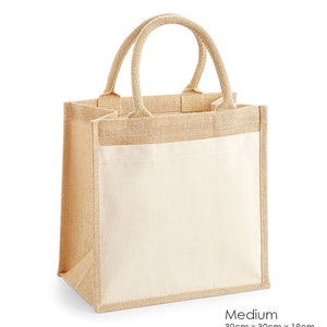 May include: A medium-sized jute tote bag with a natural brown color. The bag has a white cotton fabric panel on the front. The bag measures 12 inches by 12 inches by 7.5 inches.