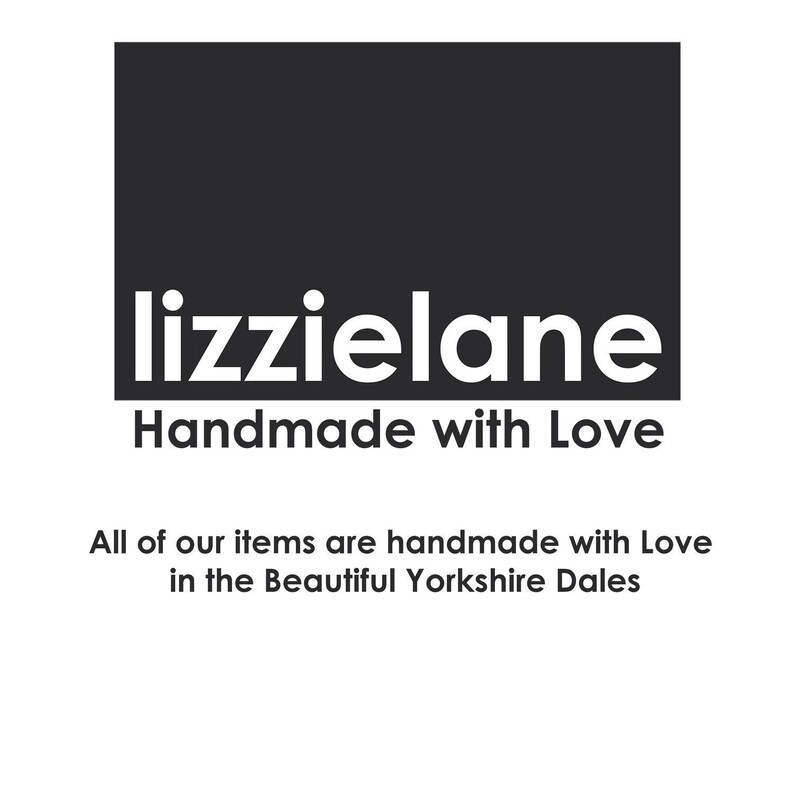a logo for a company called Lizzielane, which emphasizes the handmade nature of their items and the love that goes into creating them.