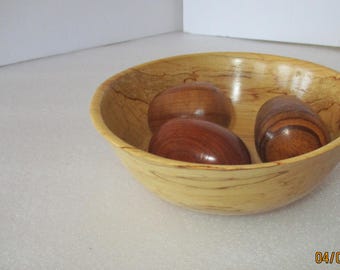 Wooden bowl with three wooden eggs. The bowl is made of Spalted Beech in the USA by a disabled US Navy Seabee Vietnam Veteran.