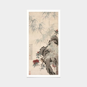 May include: A traditional Japanese painting depicting a bird perched on a branch of bamboo with red flowers. The painting is done in black ink and watercolor on a light beige background. The painting is framed in a white frame.