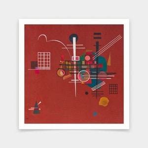 Op de afbeelding: Abstract geometrisch schilderij met een rode achtergrond. Het schilderij bevat zwarte, witte en gekleurde vormen, waaronder cirkels, vierkanten en lijnen. Het schilderij is ingelijst in een wit kader.
