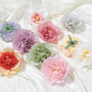 Puede incluir: Surtido de diez flores artificiales en varios colores, incluyendo rosa, morado, rojo, blanco y verde. Las flores est&aacute;n hechas de tela y tienen un aspecto realista.