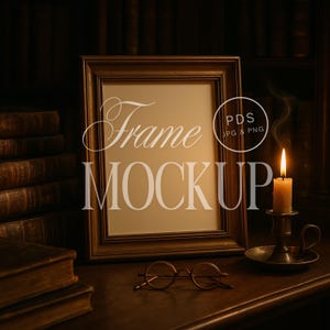 May include: A framed mockup with the words "Frame MOCKUP" in white script. A lit candle in a brass holder, round eyeglasses, and stacks of books are on a wooden surface. The background features a dark bookshelf.