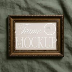 May include: A rectangular brown frame mockup with the words "Frame MOCKUP" in white script. The frame has a decorative border and a neutral background. The image includes a circle with the text "PDS JPG & PNG".