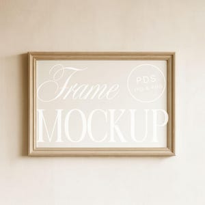May include: A rectangular wooden frame mockup with the words "Frame MOCKUP" in white script. The frame has a light brown colour and is set against a beige background. A circle with the text "PDS JPG & PNG" is in the upper right corner.