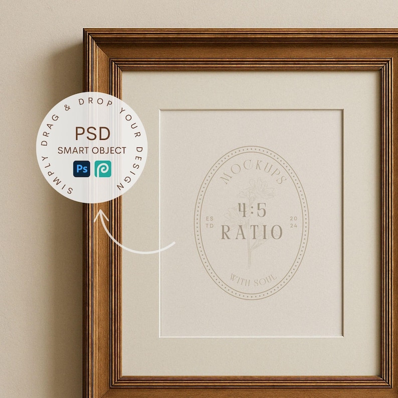 May include: A brown wooden picture frame with a white mat and a white background. The frame has a white sticker on the left side that says "Drag & Drop Your Design PSD Smart Object" with a Photoshop icon and a swirl icon. The frame has a white sticker on the right side that says "Mockups 4:5 Ratio With Soul" with a floral design.