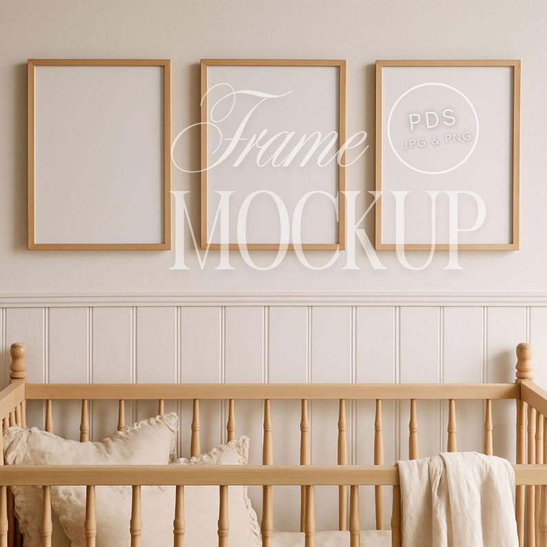 May include: Three wooden picture frames with a light beige background. The frames are rectangular with a light brown border. The text "Frame Mockup" is overlaid on the frames. A wooden crib is in the foreground.