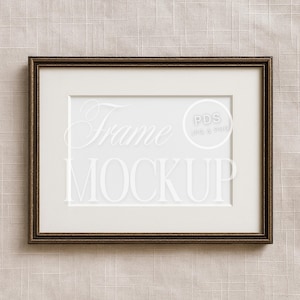 May include: A brown wood picture frame with a white mat and a white background. The frame has a simple, classic design. The text "Frame Mockup" and "PDS JPG & PNG" is visible in the image.