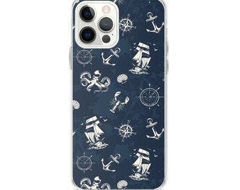 Puede incluir: Una funda transparente para teléfono con fondo azul marino y un patrón náutico blanco. El patrón incluye barcos, anclas, brújulas y un pulpo.