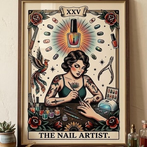 May include: A framed print with a tattoo-style illustration of a nail artist. The artwork depicts a woman with tattoos, nail polish bottles, tools, and the text "THE NAIL ARTIST." The color scheme includes reds, greens, and browns.
