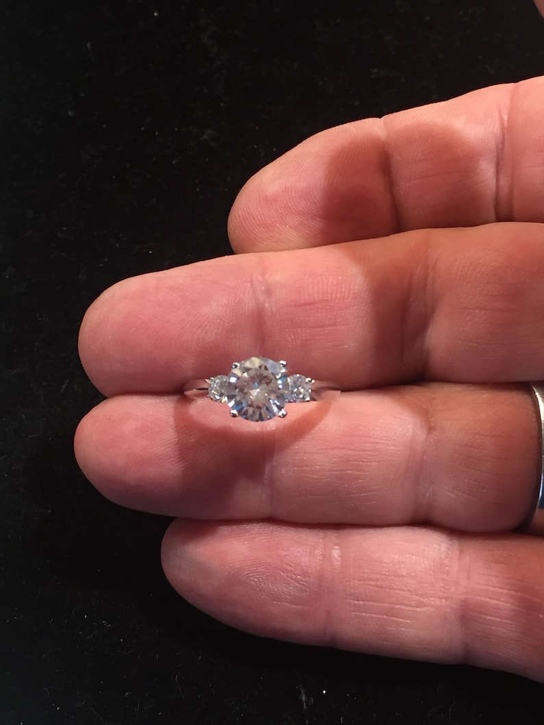 2 carat 8mm Round Brilliant Cut Cubic Zircon set in 925 Sterling Engagement Ring