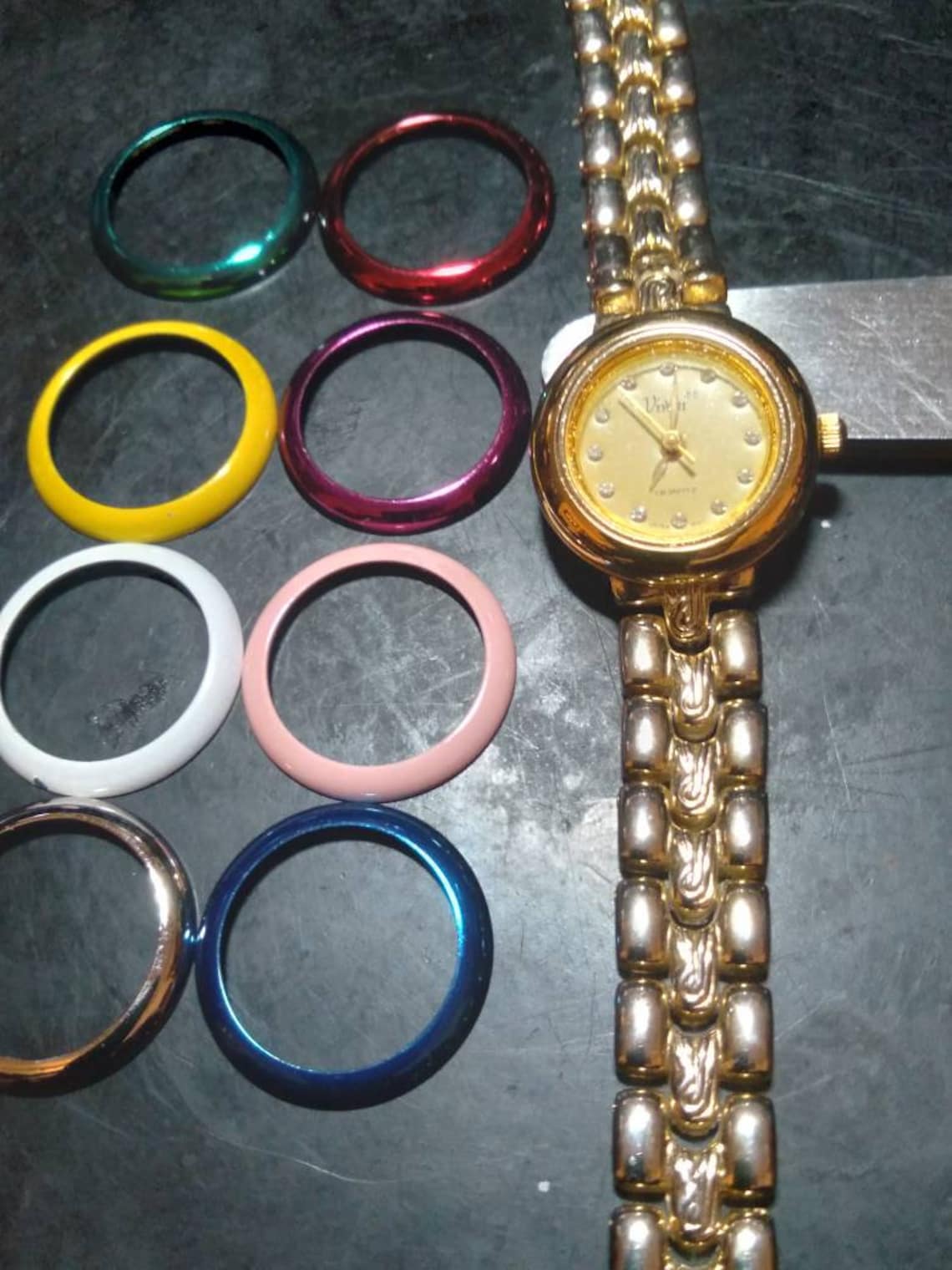 Vivani quartz watch with interchangeable bezels and matching Etsy