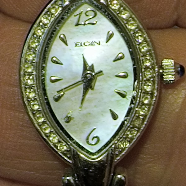 Elgin MOP dial sapphire sets runs 10.00