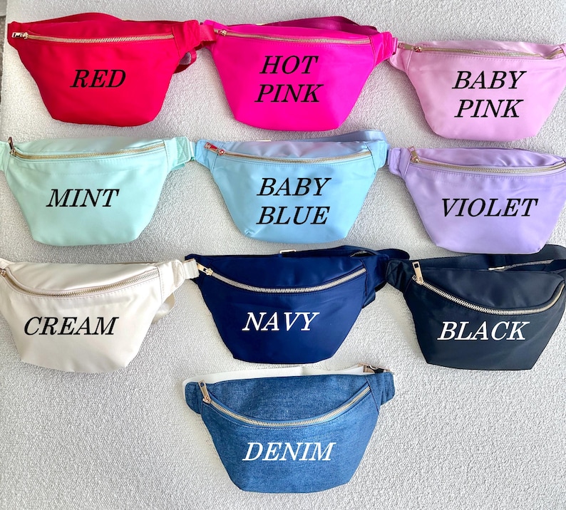 May include: Nine different colors of fanny packs with gold zippers. The colors are red, hot pink, baby pink, mint, baby blue, violet, cream, navy, and denim.