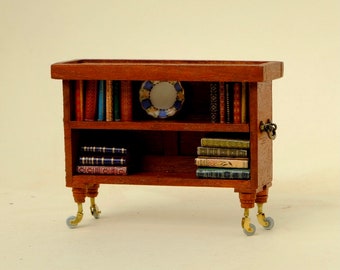 Hand made mahogany portable book case on wheels