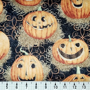 May include: Black fabric with a repeating pattern of orange jack-o'-lantern faces with smiling expressions. The pumpkins are surrounded by brown hay and black swirls.