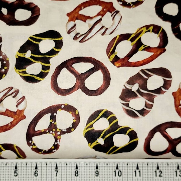 Kanvas Chocolate Pretzels on Cream 09845 Fabric by the Yard/Piece