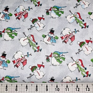 Tissu Fabric Traditions bonhommes de neige avec paillettes par mètre//pièce