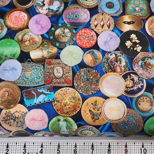 May include: A colourful fabric with a repeating pattern of various shapes and designs. The fabric features a variety of colours, including blue, green, red, yellow, and white. The shapes include circles, squares, and stars. The designs include flowers, butterflies, and geometric patterns.