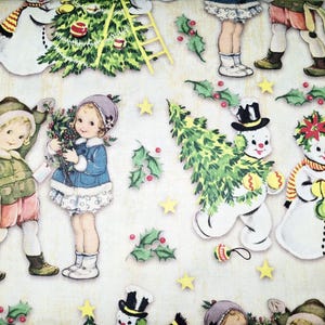 May include: A white and green Christmas wrapping paper with a repeating pattern of snowmen, children, and Christmas trees. The paper features a red and white striped candy cane, a red and white striped stocking, and a red and white striped bow.