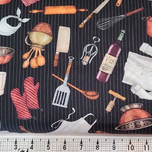 May include: Black and white striped fabric with a variety of kitchen-themed illustrations, including a rolling pin, a whisk, a bottle of wine, a chef's hat, and a pair of oven mitts.