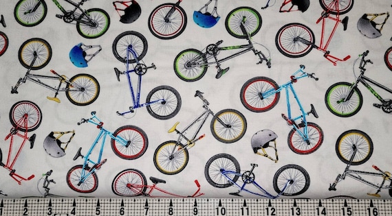 Elizabeth Studios In Motion Bikes on White 459 Fabric by the Yard//Piece