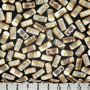 May include: Black fabric with a repeating pattern of wine corks and wine glasses. The corks are brown and have a detailed design of grapes and vines. The wine glasses are clear and have a simple design.