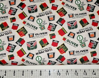 Sykel Enterprises Oliver Logos on Cream 10430 Fabric by the Yard//Piece