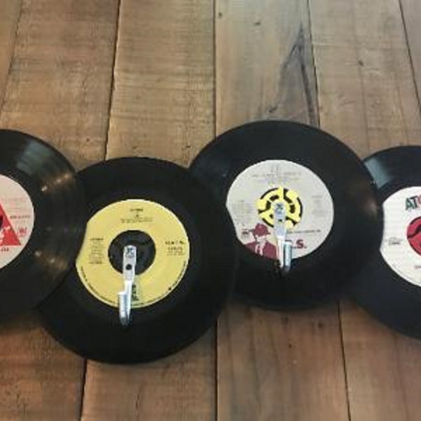 Upcycled 45 Record Rack featuring four 7" vinyl records with heavy duty hooks.  Perfect for a music fan's keys, belts, jewelry and more!