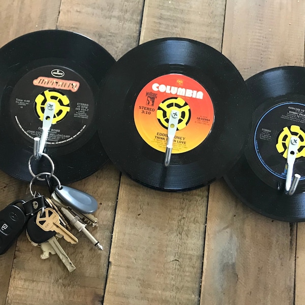 Upcycled 45 Record Rack featuring three 7" vinyl records with heavy duty hooks.  Perfect for a music fan's keys, belts, jewelry and more!