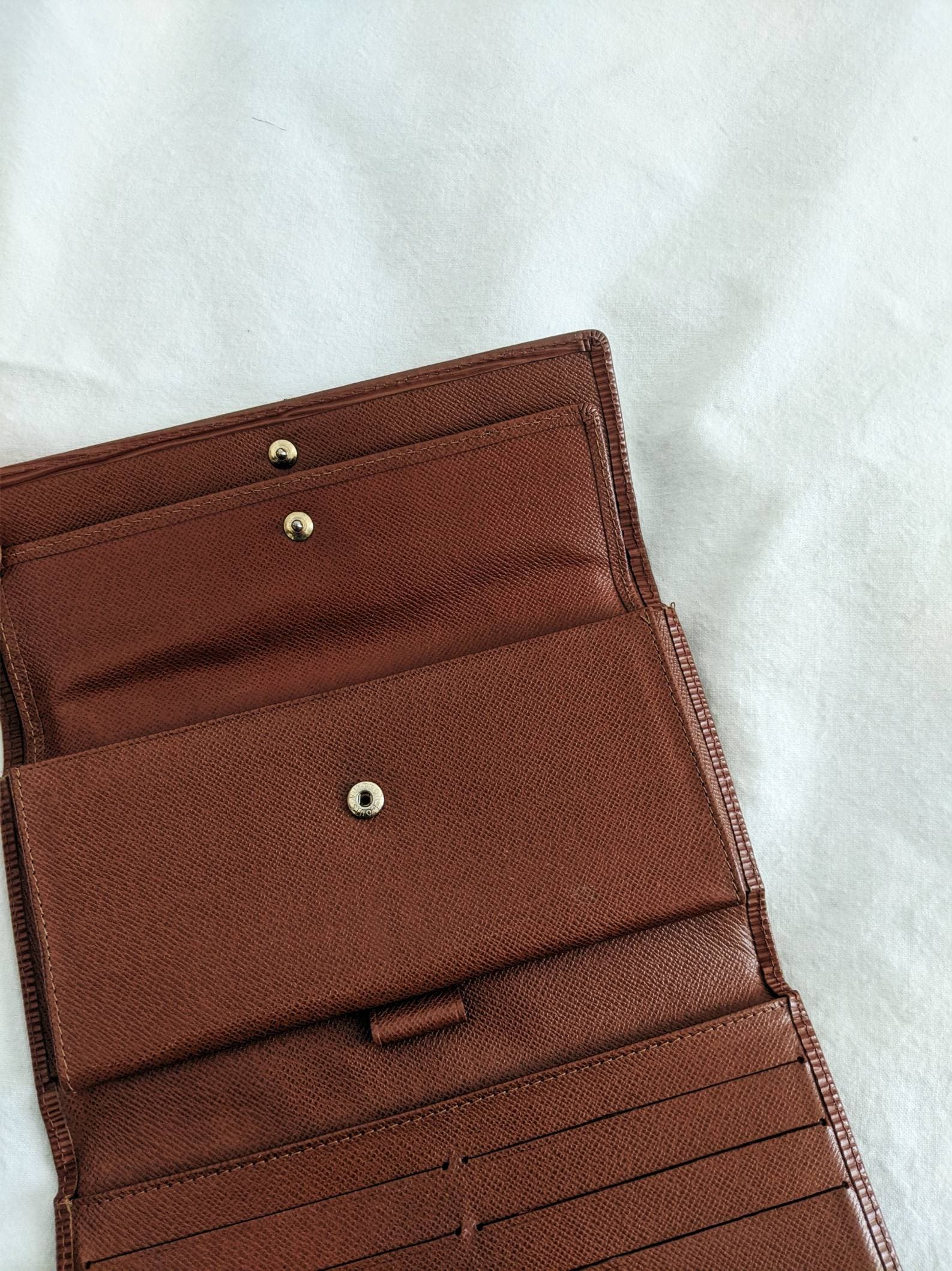 Leather wallet Louis Vuitton Brown in Leather - 31380338