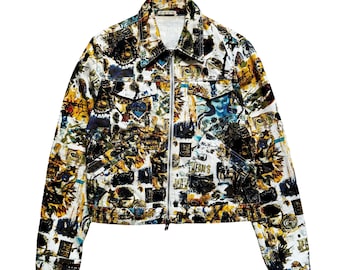 May include: A long-sleeve zip-up jacket featuring a vibrant, multi-colored collage print. The design includes abstract shapes, faces, and text elements in shades of yellow, blue, black, and white. It has a standard collar, two chest pockets, and a silver zipper.