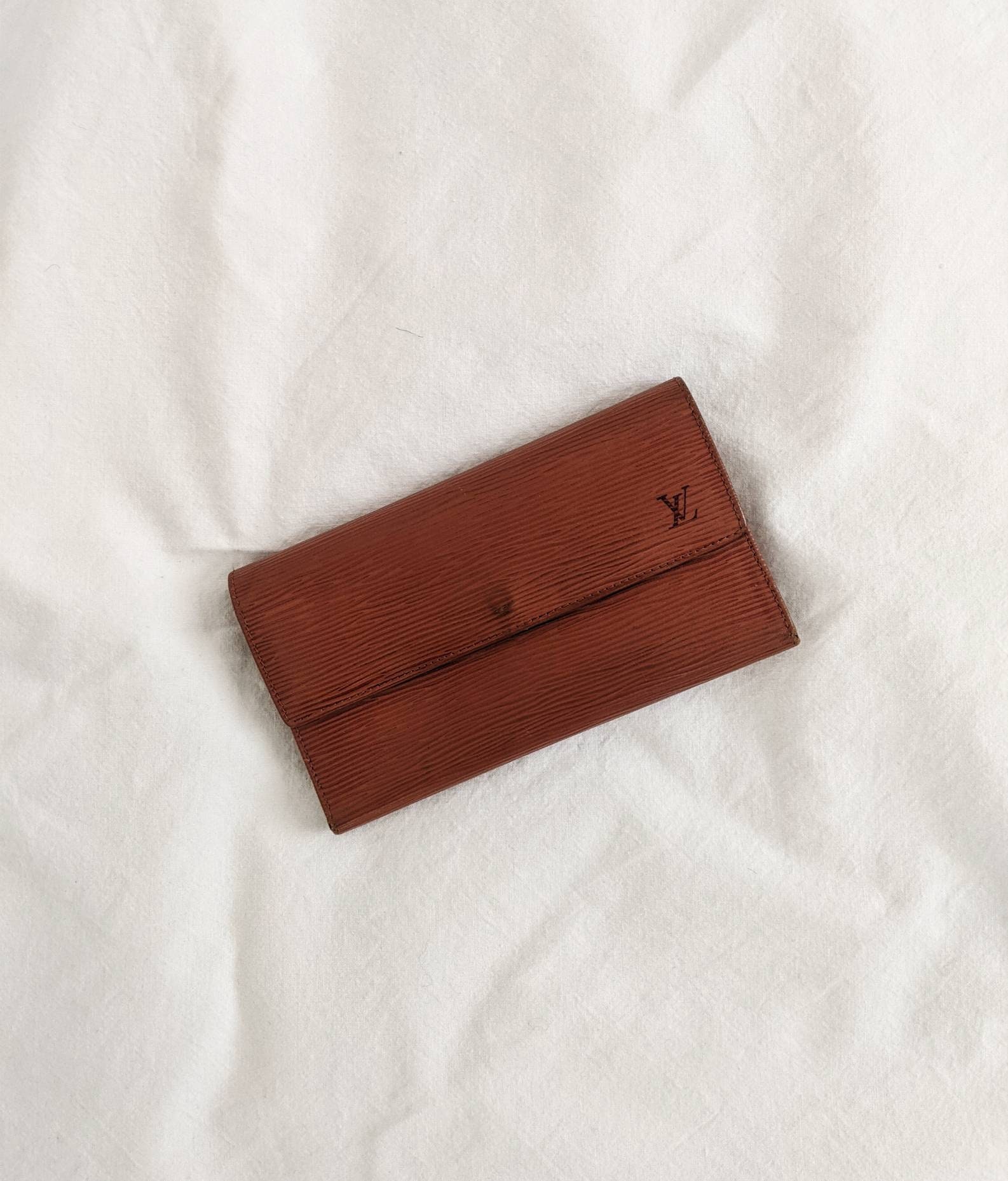 Leather wallet Louis Vuitton Brown in Leather - 31326942