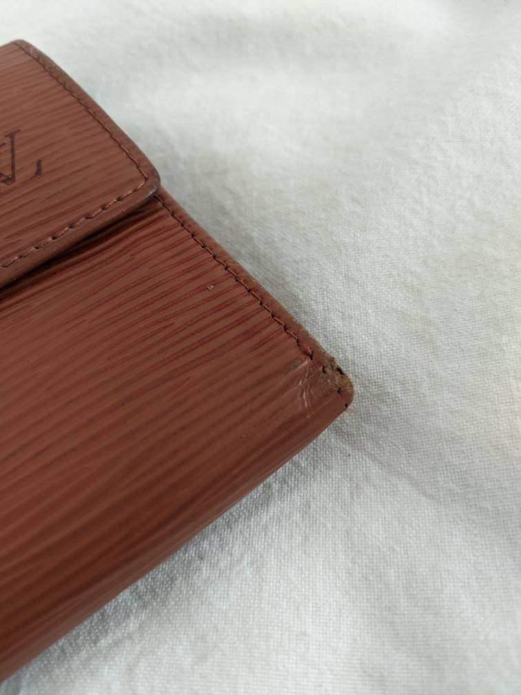 Leather wallet Louis Vuitton Brown in Leather - 25501809