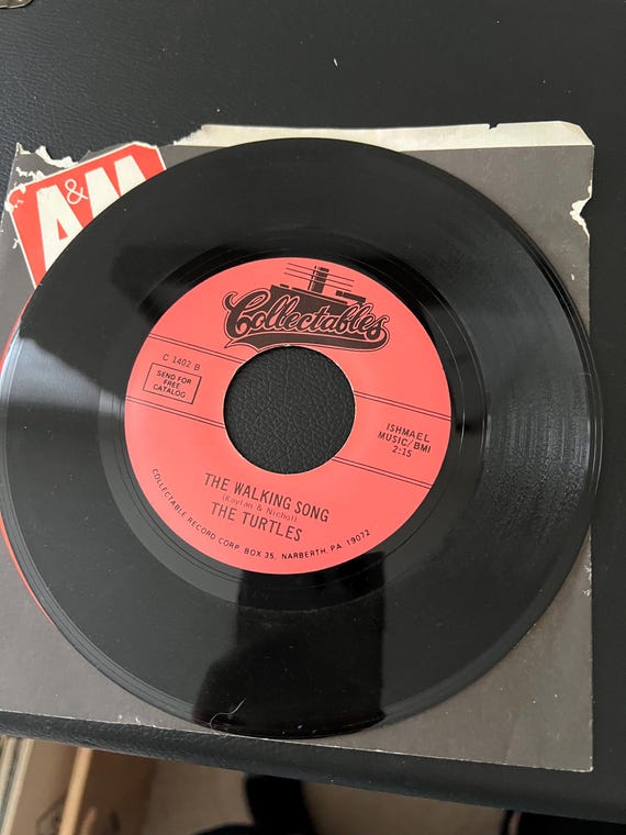 The Turtles 7" Record 45 Happy Together / The Walking Song collectables label